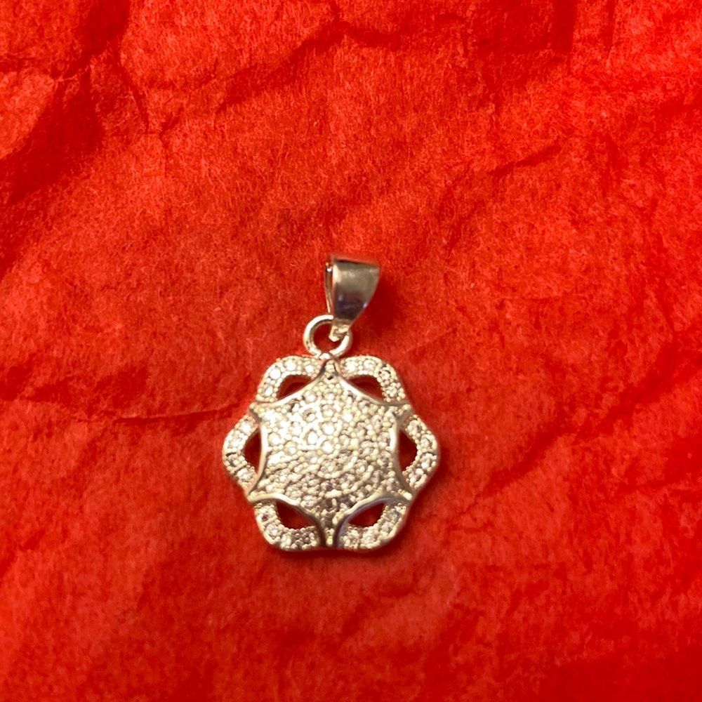 5/$25 Faux pendant: silver with diamond chips. Costume Jewelry.